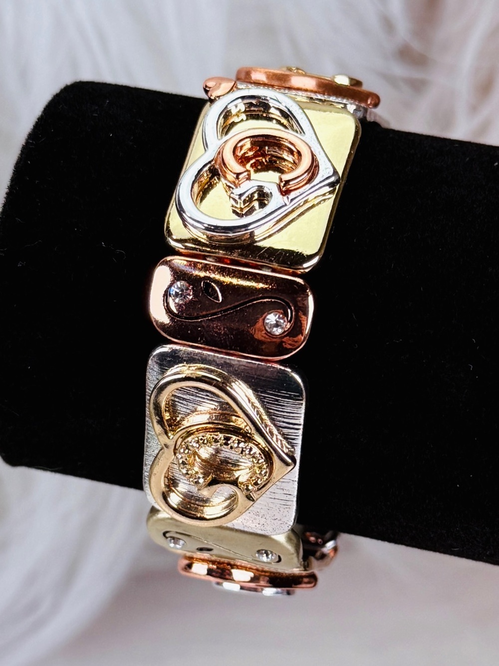 Beautiful, multitone, metal, stretch, heart accent costume bracelet